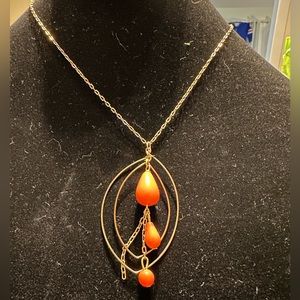 Necklace gold and salmon beads.